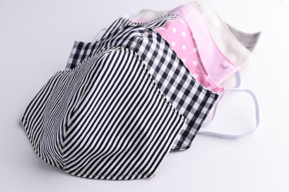 face mask handmade from fashion fabric cloth on white background